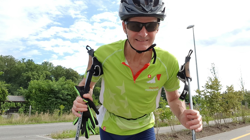 A smile before the start of a roller ski interval session