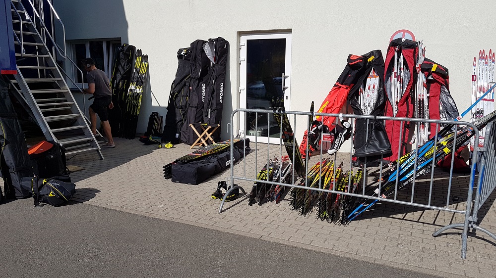 XC skis in front of the Norwegian Waxing truck waiting for waxing XC skis waiting to be waxed